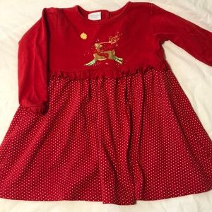 Red polka dot dress with reindeer appliqué